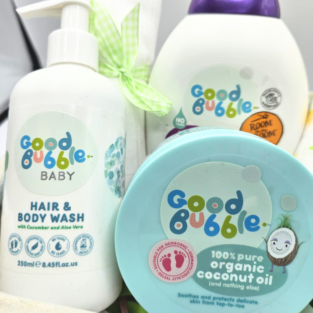 Good Bubble Baby Bath Time Gift Basket. This simple but gorgeous baby basket contains a special range of natural baby skincare from Good Bubble, alongside soft baby muslin squares.