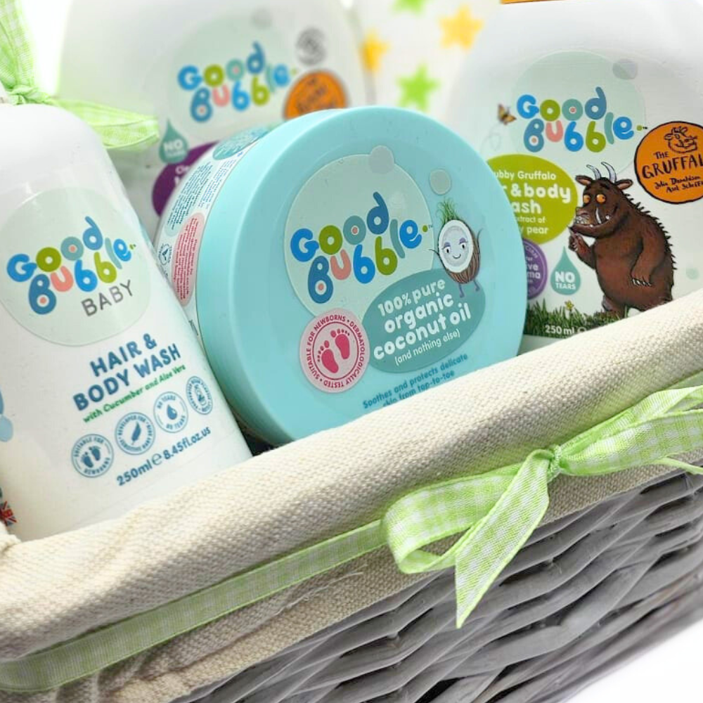 Good Bubble Baby Bath Time Gift Basket. This simple but gorgeous baby basket contains a special range of natural baby skincare from Good Bubble, alongside soft baby muslin squares.