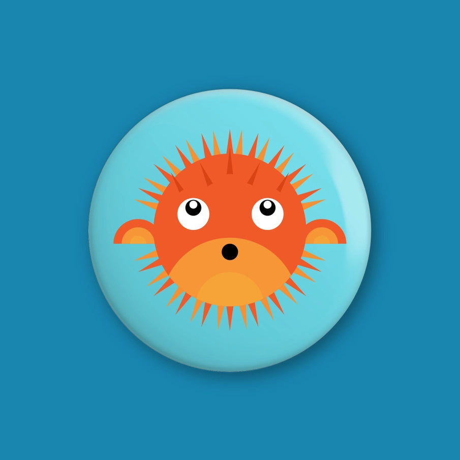 Hey There Munchquin Pufferfish Button Badge - a quirky and fun pin badge featuring a cute orange pufferfish! Sold by Say It Baby Gifts