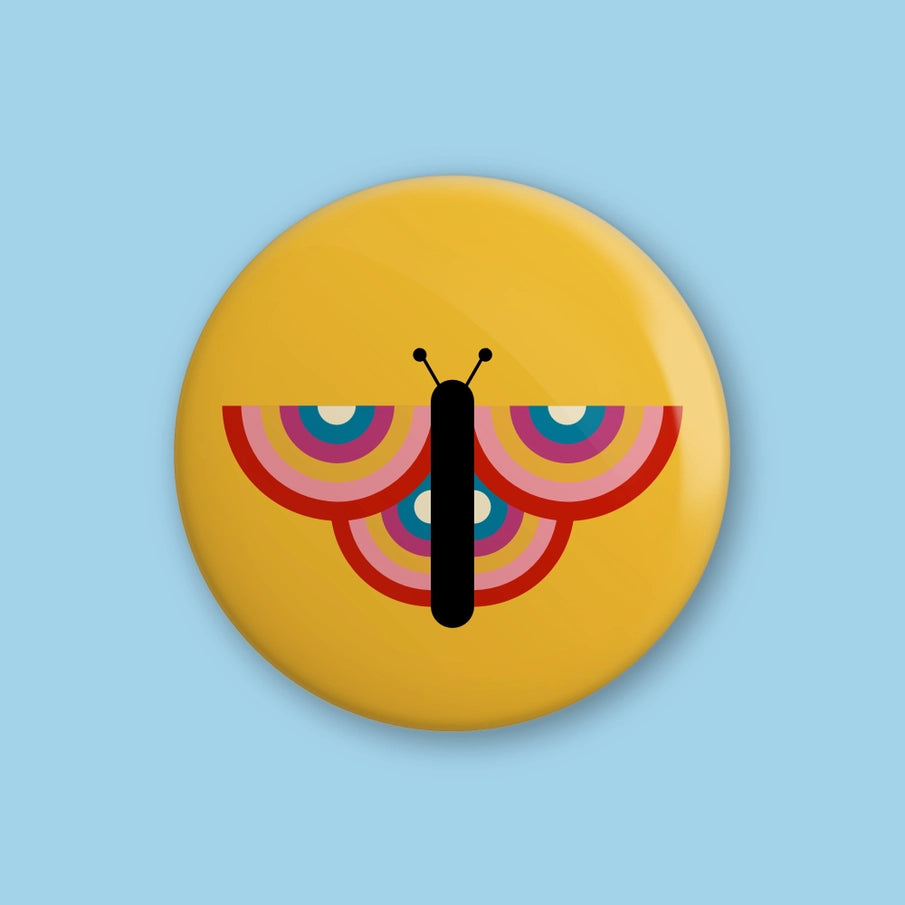 Hey There Munchquin Retro Butterfly Button Badge - a quirky and fun pin badge featuring a retro rainbow butterfly on a yellow background.