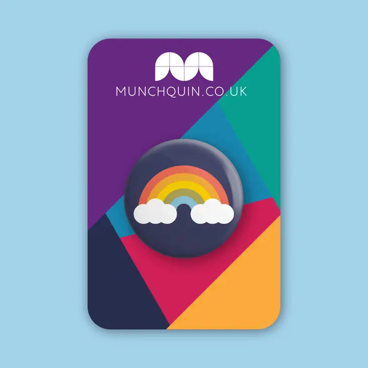 Hey There Munchquin Retro Rainbow Button Badge - a quirky and fun pin badge featuring a retro coloured rainbow on a navy background.