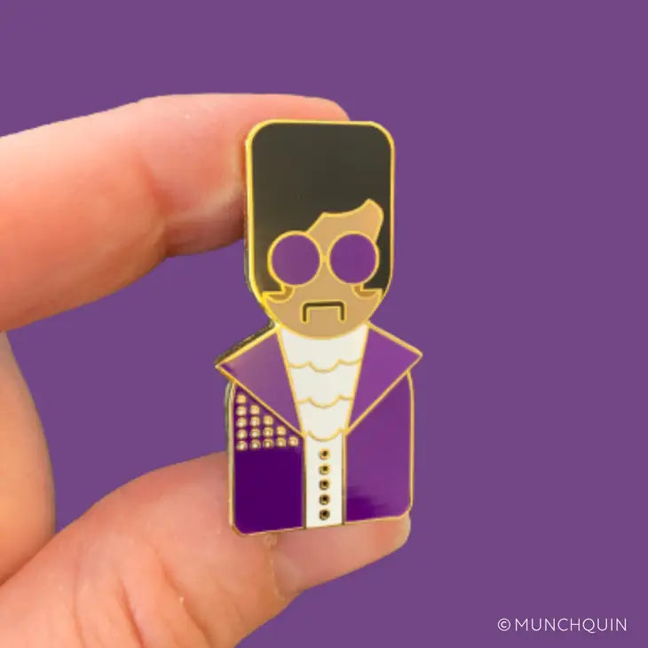 Munchquin Prince Hard Enamel Pin- a quirky and fun enamel pin badge featuring the legendary artist Prince.
