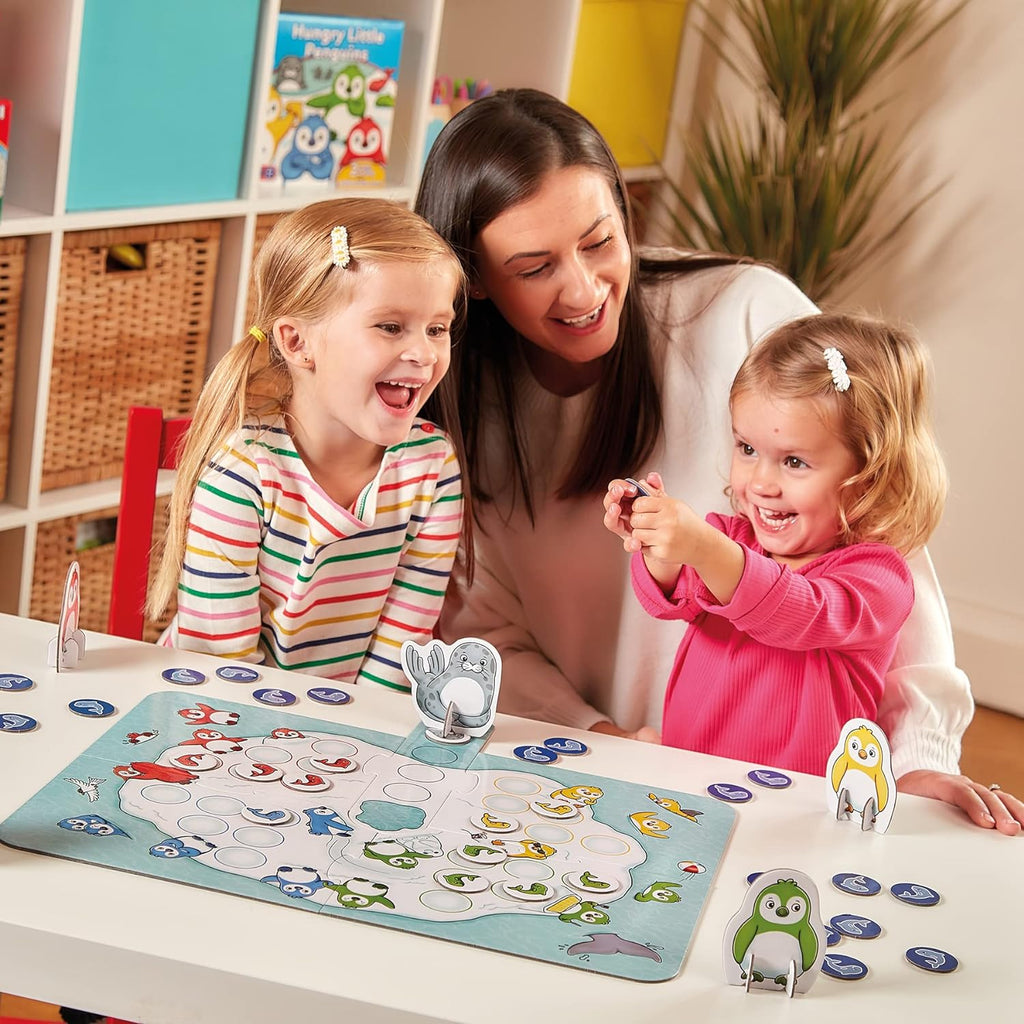 Orchard Toys Hungry Little Penguins Game - Collect the colourful fish, but watch out for the pesky seal who wants to steal them! Sold by Say It Baby GIfts