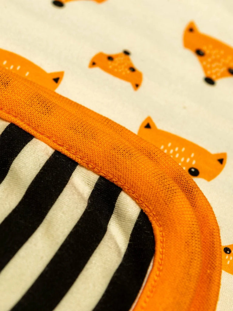 Blade & Rose Fox Blanket - bold, bright and fun! This gorgeous blanket is made from soft cotton and features a sweet orange fox design on one side and contrasting black and cream stripes on the reverse.. Sold by Say It Baby Gifts