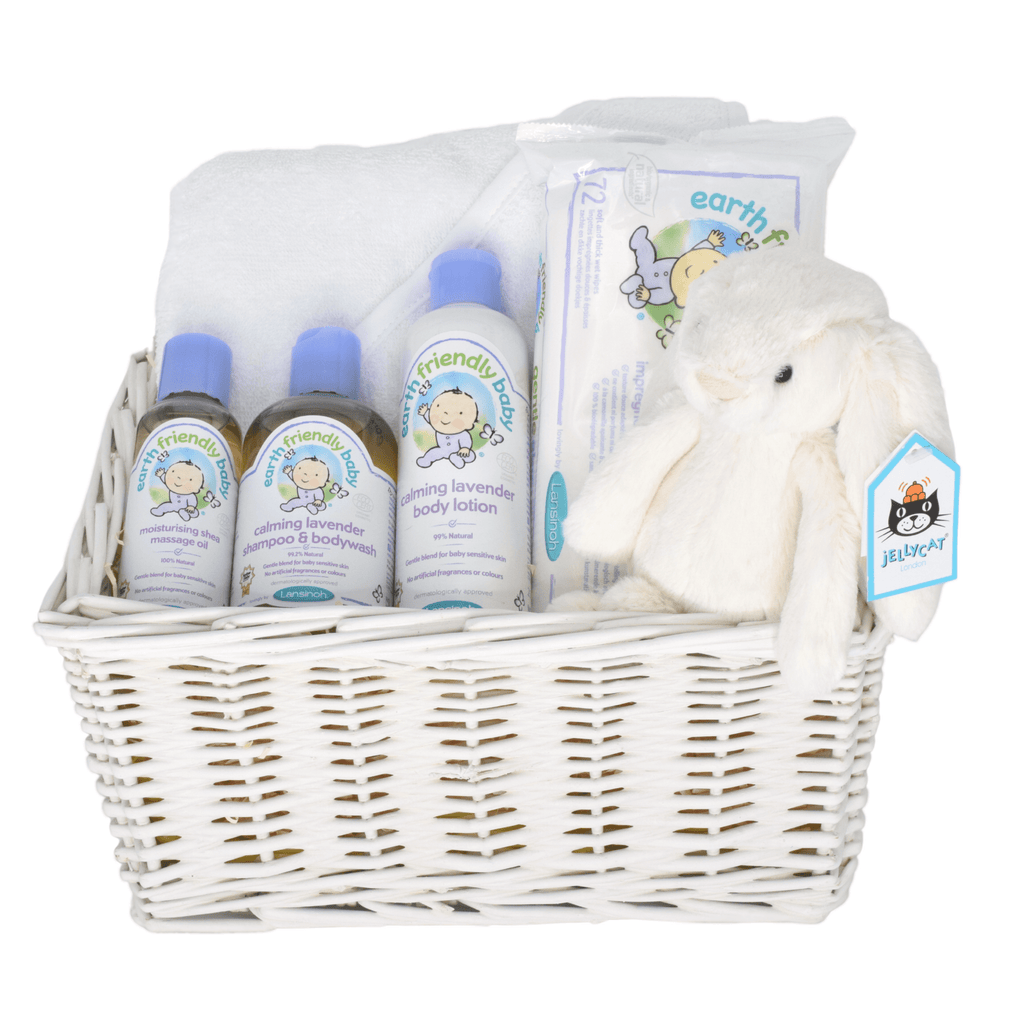Natural Baby Bath Time Gift Basket. This simple but gorgeous baby basket contains a special range of natural baby skincare, alongside a soft cotton hooded baby towel and a sweet little Jellycat bunny.