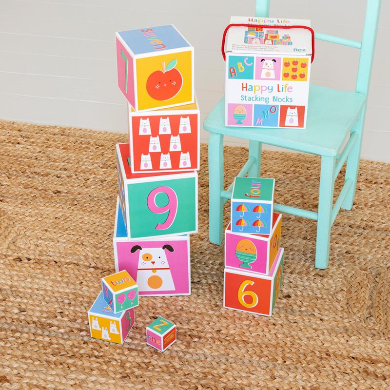 Happy Life Stacking Blocks - Bright, educational and fun, this lovely box of stacking blocks is a great gift. Rex London. Sold by Say It Baby Gifts