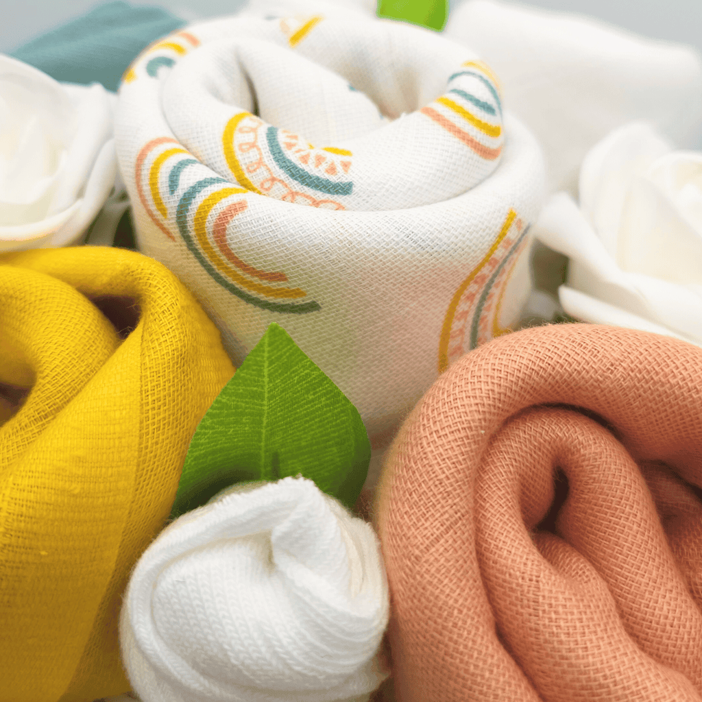 Say It Baby - Scandi Rainbow Baby Muslin Square Bouquet. This lovely scandi themed bouquet is part of our Muslin Square Bouquet range. Sold by Say It Baby Gifts - closeup