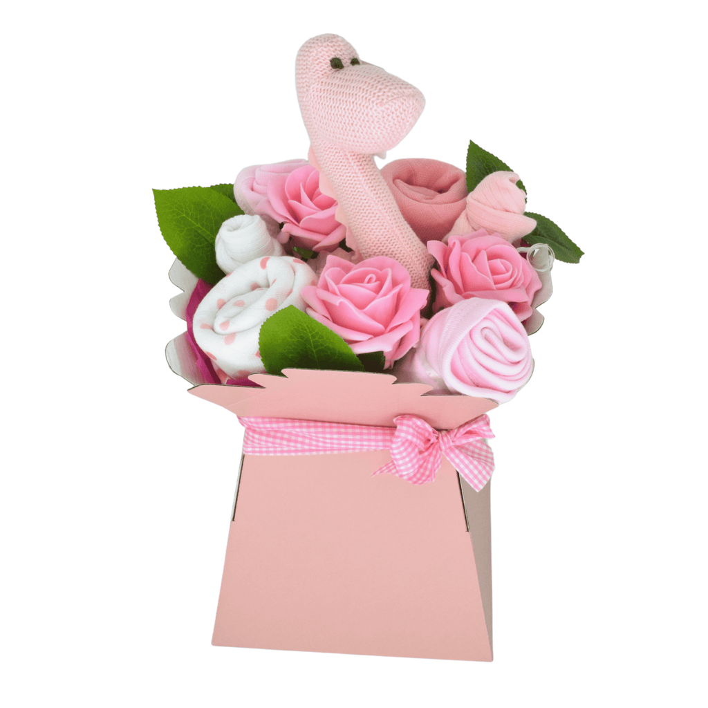 Say It Baby - Sweet Baby Pink Dino Bouquet. This roaringly cute baby bouquet in pinks is a gorgeous gift to welcome a new baby girl into the world!