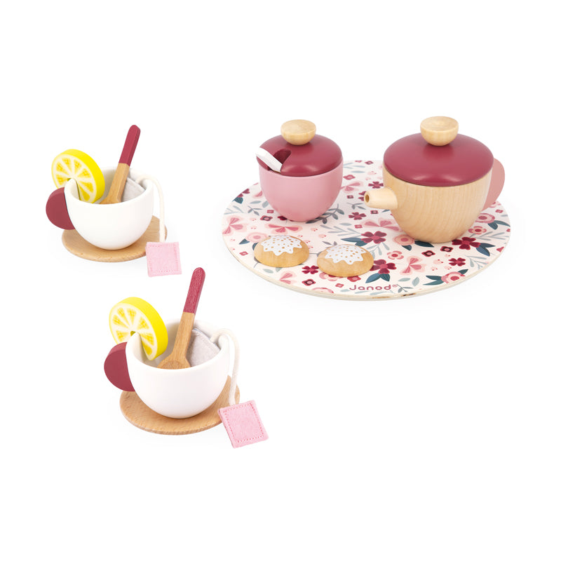 The set includes a wooden teapot, sugar bowl, two cups, two saucers and three spoons as well as two felt teabags, two lemon slices and two biscuits for extra fun! With biscuit and sweet floral tray