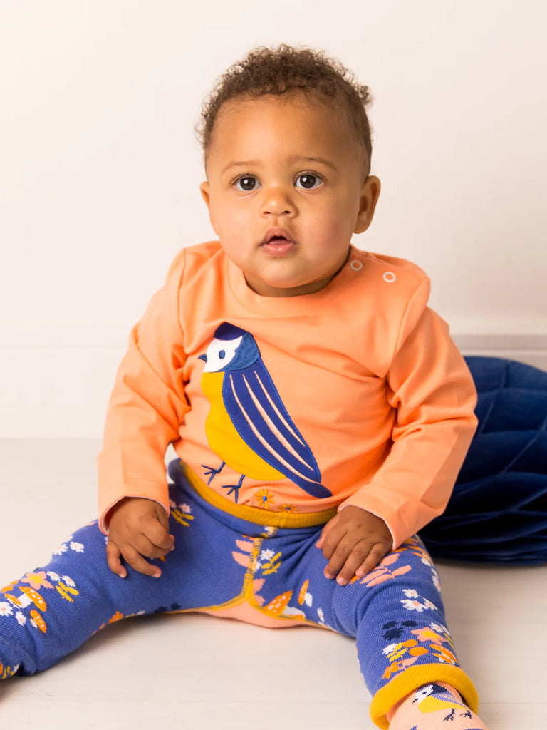 Blade &amp; Rose Kind to Nature Top- bold, bright and fun! This gorgeous peach top features a sweet blue tit bird applique. Sold by Say It Baby Gifts