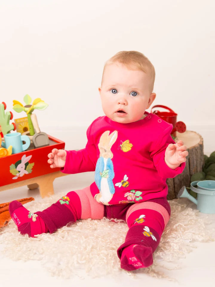 Blade & Rose Peter Rabbit Autumn Leaf Top - bold, bright and fun! This gorgeous top in a deep pink features a soft fleece applique Peter Rabbit. Sold by Say It Baby Gifts. Matching leggings and socks available too!