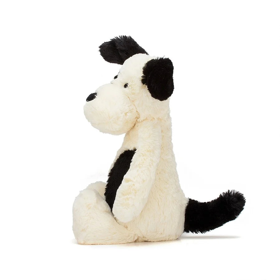 Jellycat Bashful Black & Cream Puppy. This super soft Jellycat pup is super-soft with cream fur, smudgy black patch and sooty tail.. BAS3BCPN  Sold by Say It Baby Gifts