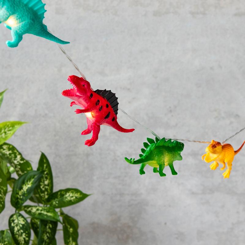 Rex London String of LED Dino Lights - these fab lights features eight colourful dinosaurs, perfect for turning any bedroom into a prehistoric land! Say It Baby Gifts