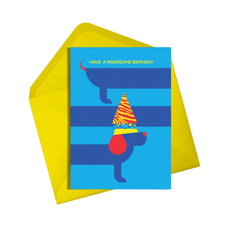 This colourful card from Alphabots features a dark blue sausage dog with a party hat and the words "Have a Pawesome Birthday"