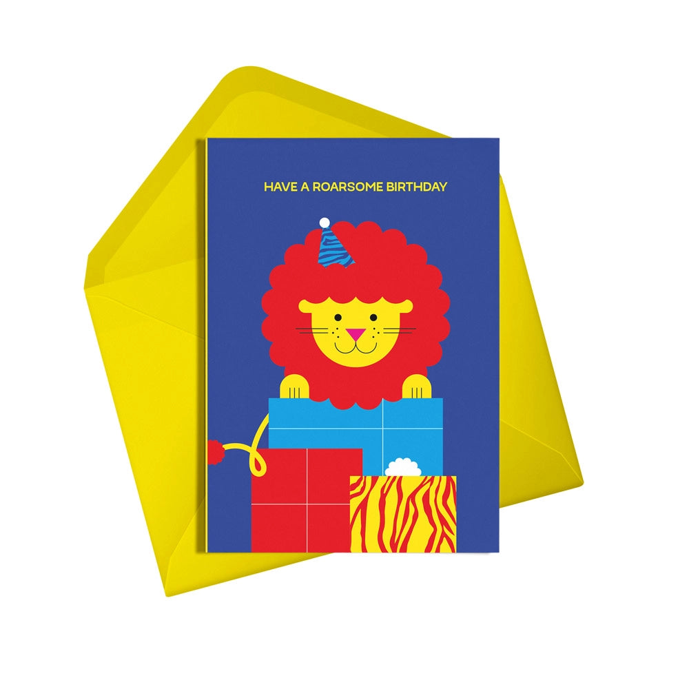 This colourful card from Alphabots features a smiling lion with a party hat, presents and the words "Have a Roarsome Birthday"