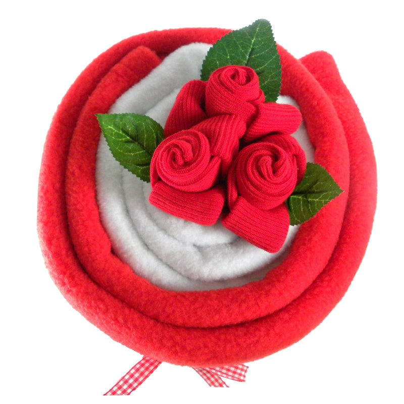 Red Baby Blanket Bouquet - Say It Baby - Featuring two soft and fluffy baby blankets, the arrangement also includes three pairs of sweet baby socks in red, (each "bud" hand-crafted into a delicate flower).