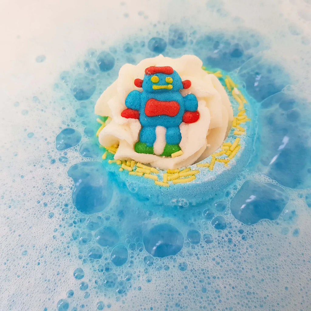This Bomb Cosmetics Robo-Bomb Bath Blaster features a fun Robot character who fizzes away creating a fun bath time experience! Combining pure cedarwood & vetiver essential oils it has a masculine scent with light citrus notes. 160g. Sold by Say It Baby Gifts 