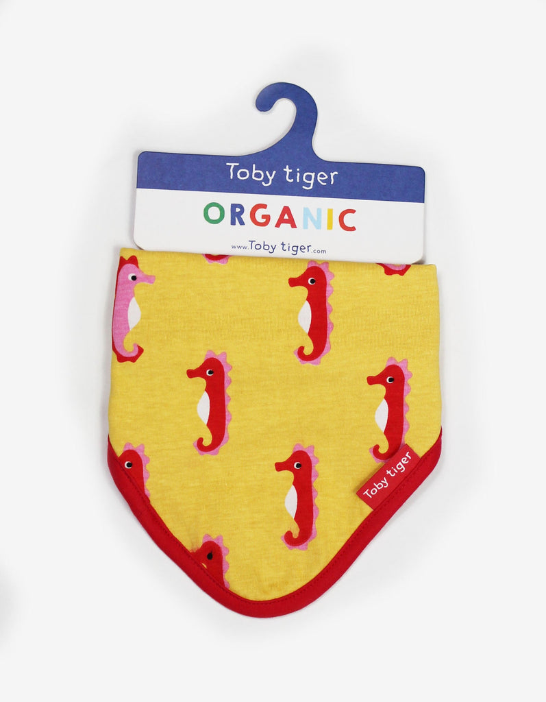 Toby Tiger Seahorse Dribble Bib - A gorgeous bib in yellow featuring sweet seahorses with a bold red trim.