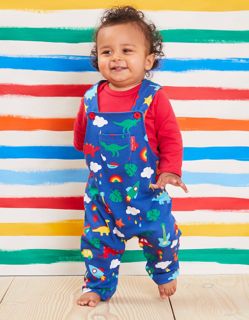 Toby Tiger Organic Playtime Mix-Up Print Dungarees. Sold by Say It Baby Gifts