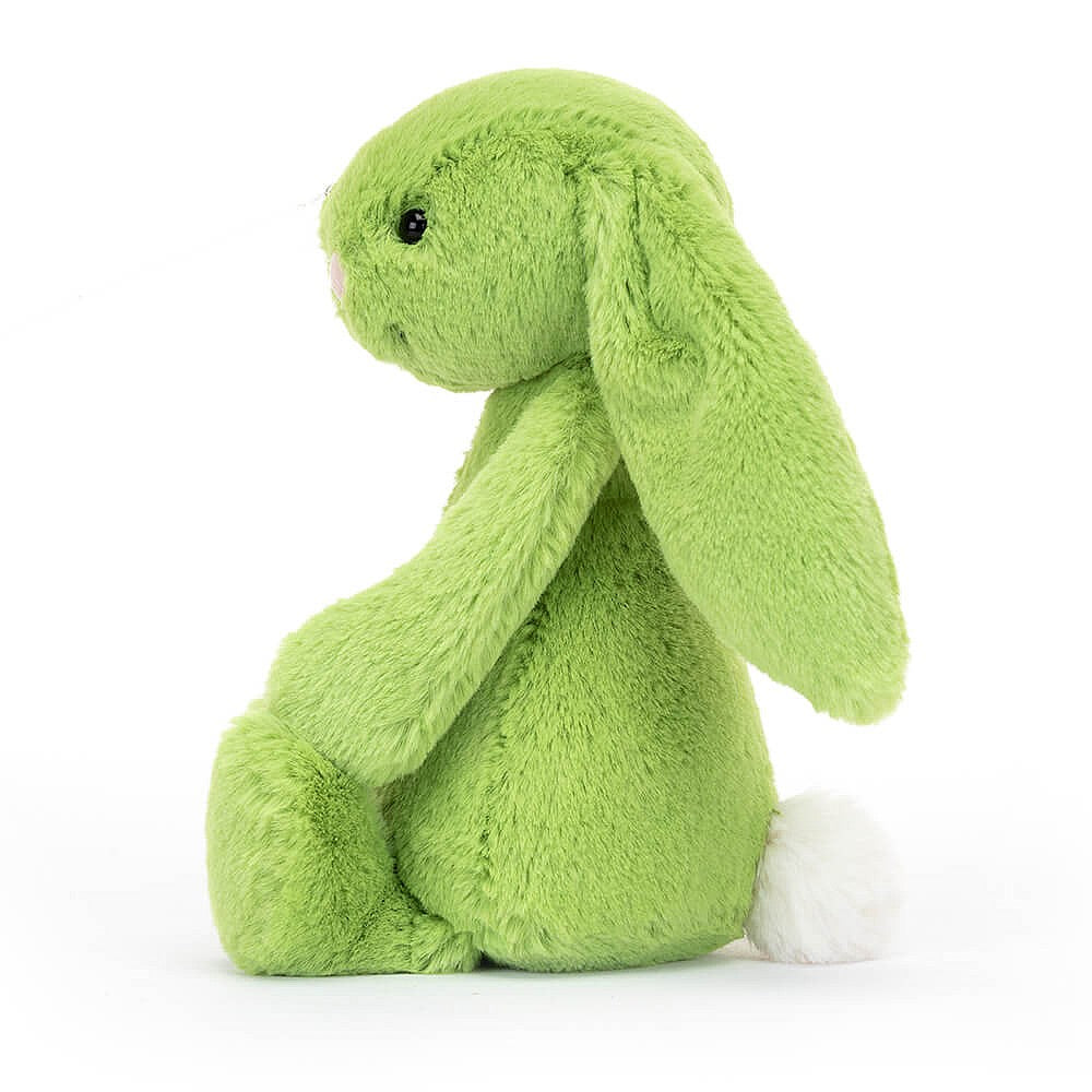 This super soft Jellycat Bashful Apple Bunny has zingy green fur,  pastel-pink nose and the cutest white bob tail!. BASS6BAP. Sold by Say It Baby Gifts. side view.