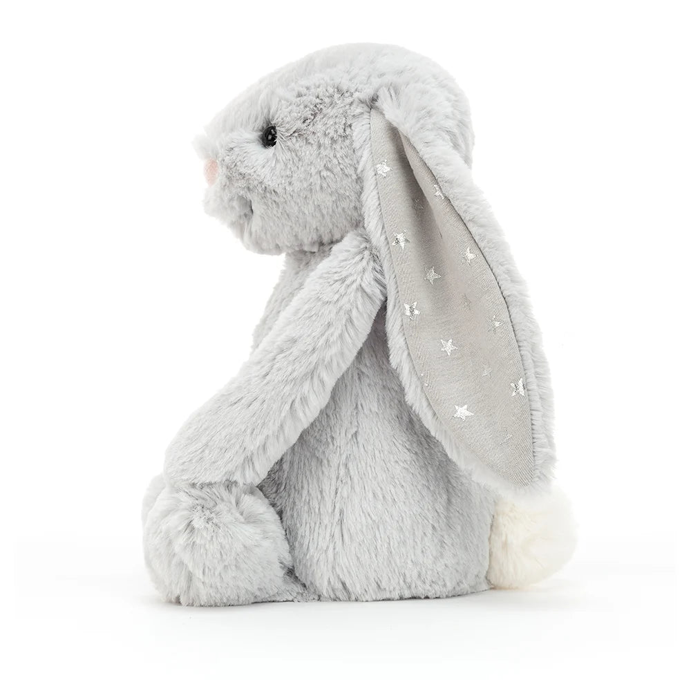 This super soft Jellycat Shimmer bunny has gorgeous soft silvery fur, long floppy sparkly ears and a cute white bobtail. She really is an ideal first soft toy and is sure to make bedtime more magical! Sold by Say It Baby Gifts