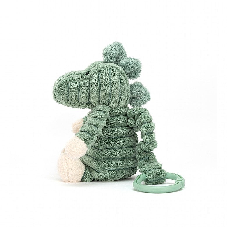 Side view Jellycat Cordy Roy Dino Jitter Toy - a soft and squashy sage coloured dinosaur with cream paws and chunky cordy body. Say It Baby Gifts