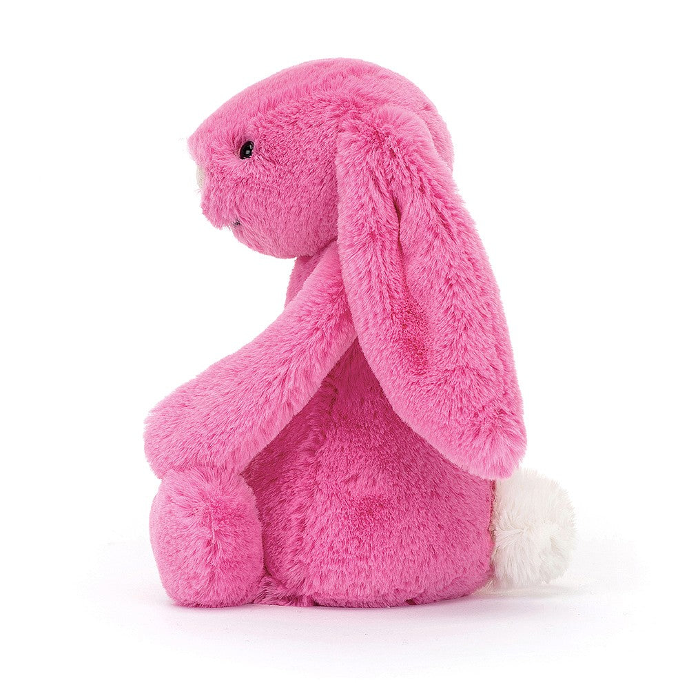 This super soft Jellycat Hot Pink Bunny has dragonfruit pink fur and a pastel-pink nose.  Sold by Say it Baby Gifts. Small. BASS6BHP - side