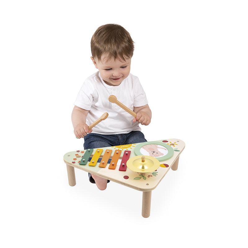 Janod Musical Table Sunshine. Sold by Say It Baby Gifts. With this wooden musical table, young musicians from 12 months old can be stimulated by music and sounds. This adorable early-learning table is compact and easy to use.