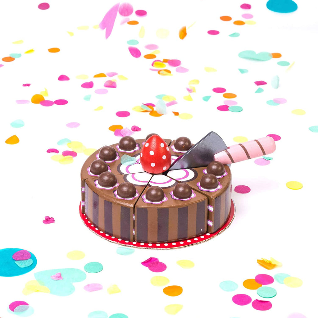 Le Toy Van Chocolate Gateau Cake. The hand painted wooden cake is finished in rich chocolate colours with a pretty floral detail and a big strawberry on top! Use the cake slice to cut this tasty desert into 6 helpings (each piece has velcro fastening for added realistic play). This lovely cake sits on a red spotty plate.