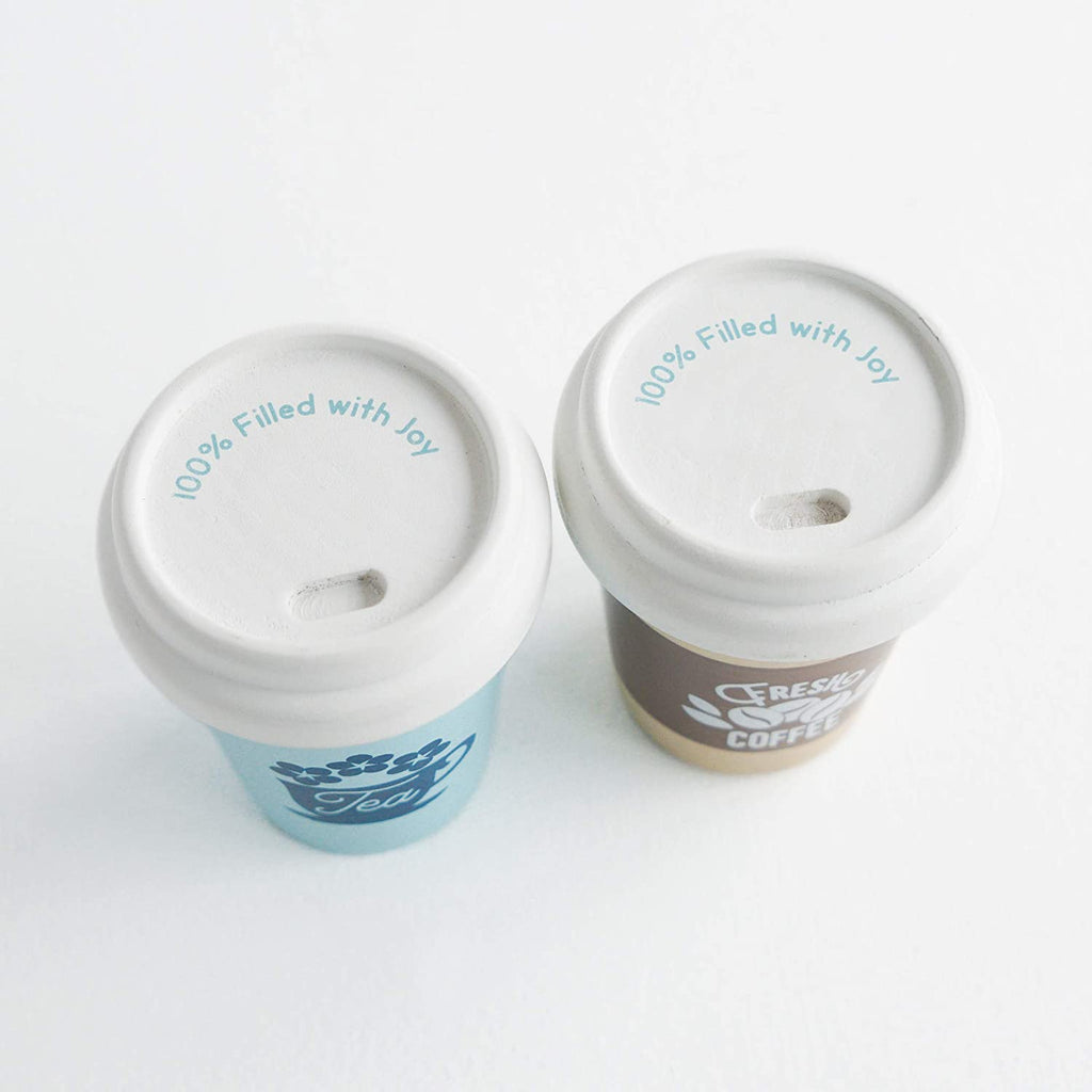 Le Toy Van Coffee & Tea On The Go Cups. The top of the lids say "100% Filled with Joy"