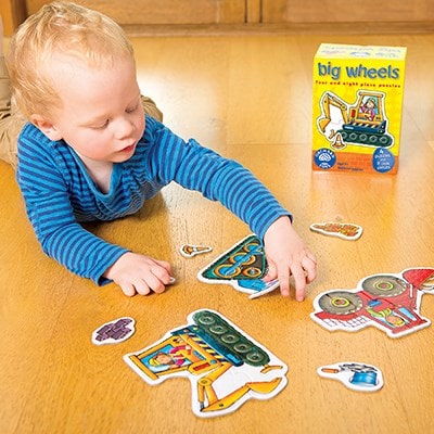 Orchard Toys Big Wheels Jigsaw Puzzle. The jigsaw also includes 8 extra play pieces for added value and to encourage imaginative role play.