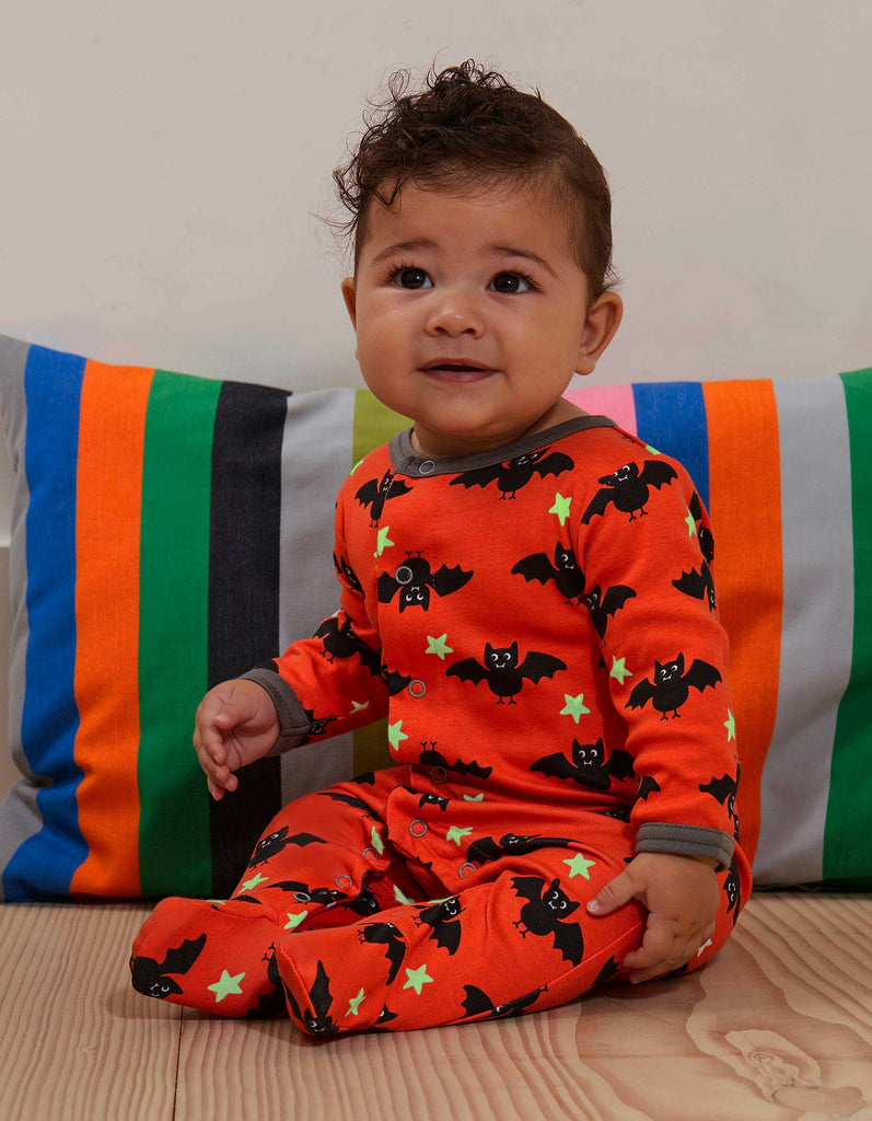 This fabulous Toby Tiger Organic Bat Print Sleepsuit is bright orange in colour with cute black bats and contrasting grey trim. It also glows in the dark! Sold by Say It Baby Gifts