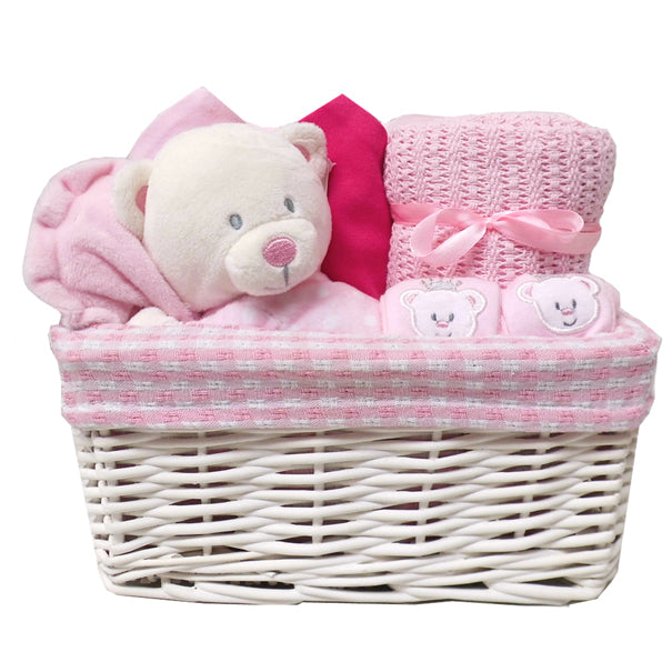White Wicker Basket with Pink Gingham Lining - Small. Dimensions : 24x18x12cm. Sold by Say It baby Gifts. Empty Basket - contents not included