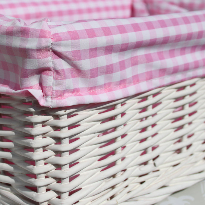 White Wicker Basket with Pink Gingham Lining - Medium. 35x24x12cm high. Sold by Say It Baby Gifts