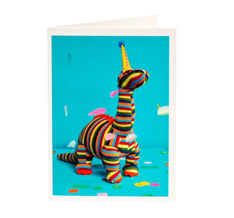 Send celebration wishes with this fab dinosaur card! Featuring a striped Diplodocus Dino in a fun party hat with a bright blue background, this card is blank inside and can be used for different occasions including New Baby Wishes, Congratulations or Happy Birthday!