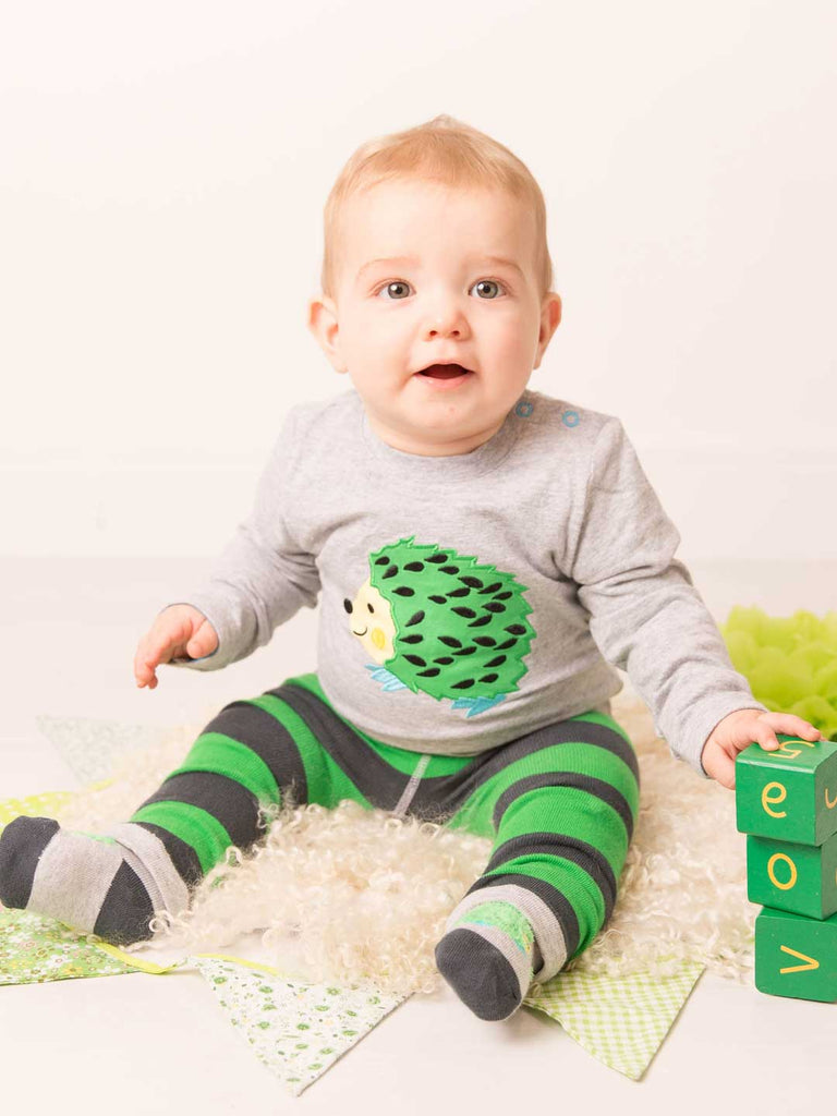 Blade & Rose Pip The Badger Top - bold, bright and fun! This gorgeous top features a sweet Hedgehog in green and charcoal with embroidery detail. Sold by Say It Baby Gifts