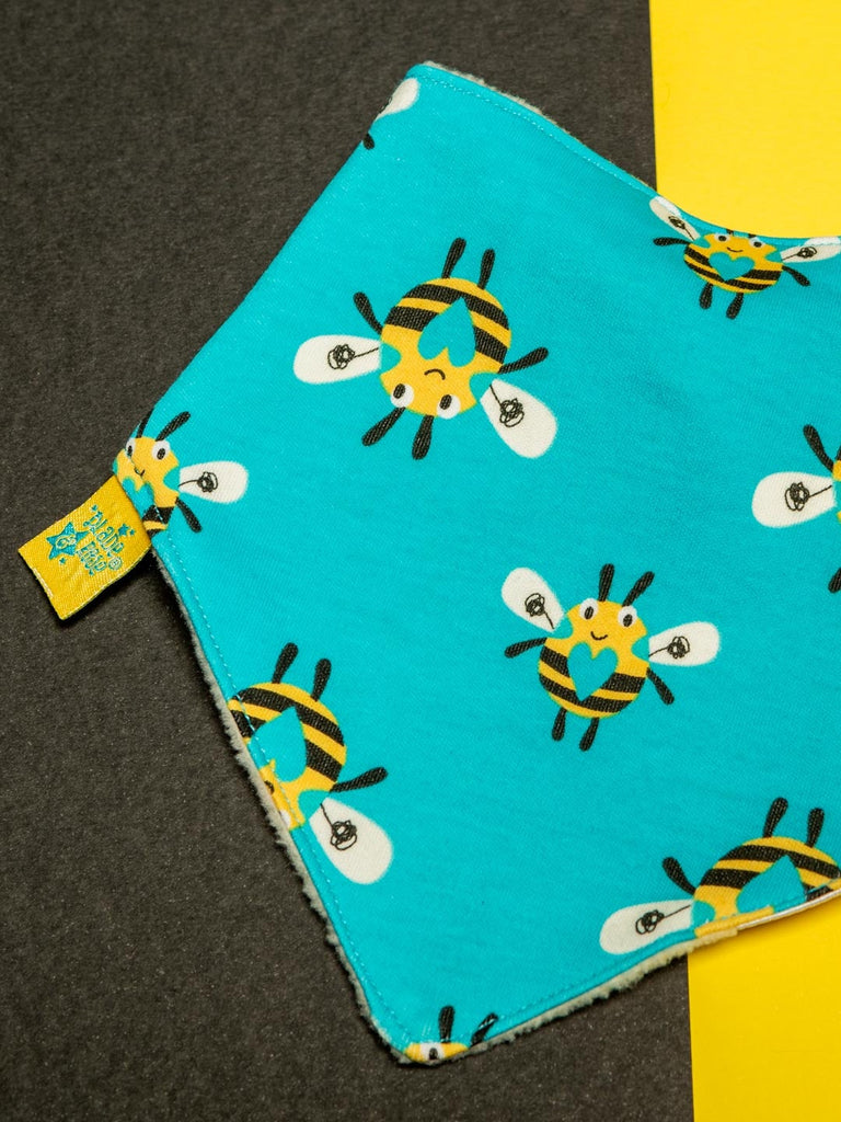 Blade & Rose Buzzy Bee Bib - bold, bright and fun! This gorgeous bandana bib is turquoise with a sweet black and yellow bee design with a love heart centre. One Size. Say It Baby Gifts