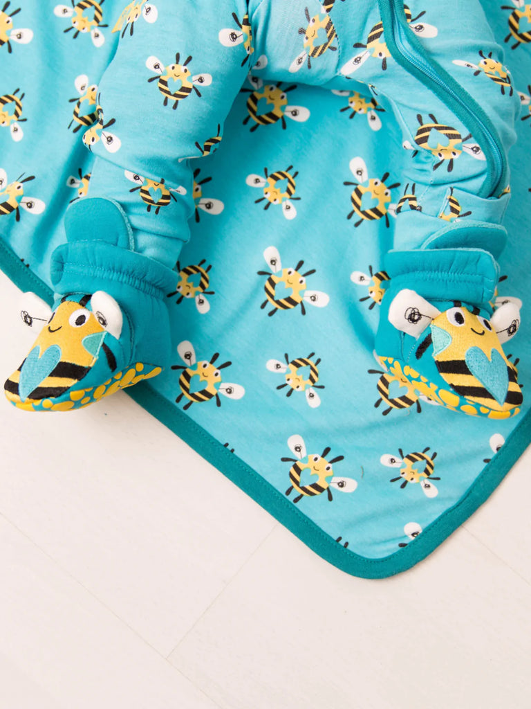 Blade & Rose Buzzy Bee Blanket - bold, bright and fun! This gorgeous blanket is made from soft cotton and features a blue and yellow buzzy bee design on one side and contrasting stripes on the reverse. Sold by Say It Baby Gifts