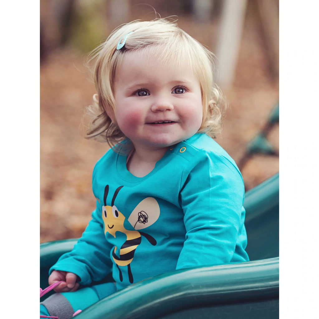 Blade & Rose Buzzy Bee Top - bold, bright and fun! This gorgeous bright teal top features a fun yellow bee design with sweet heart.