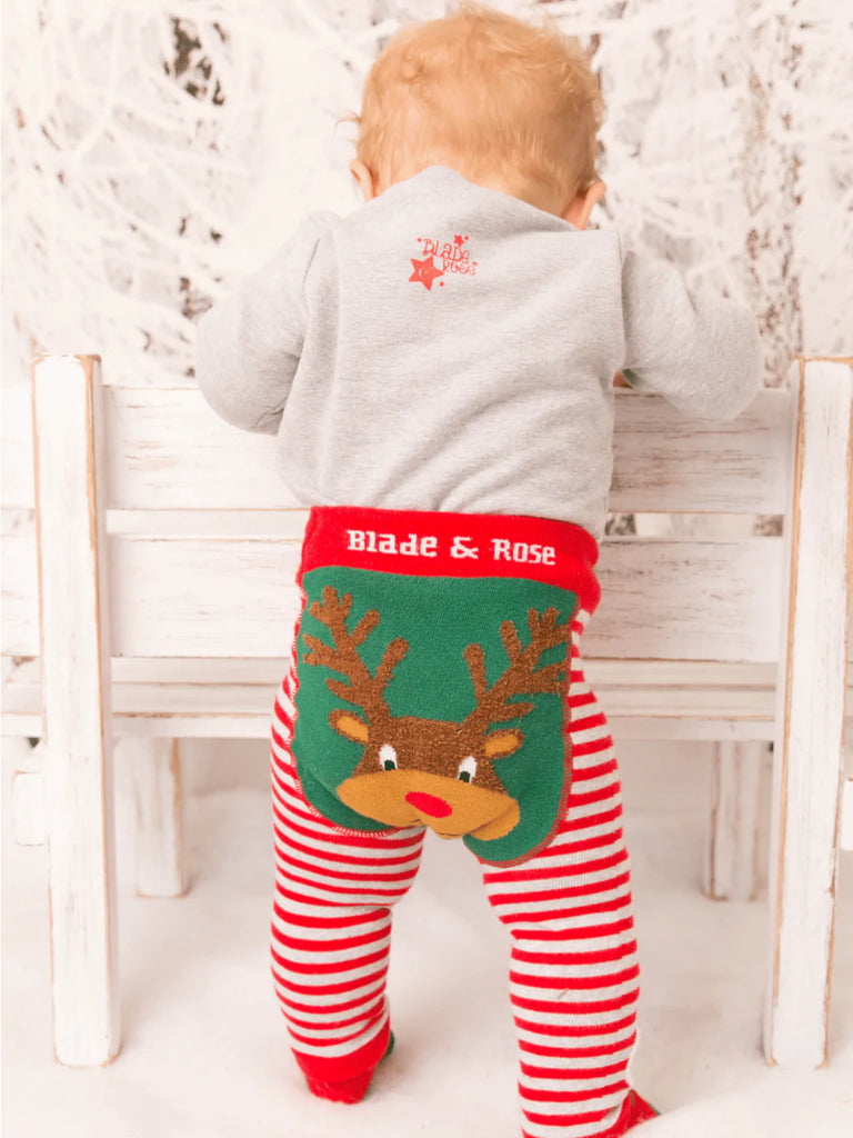 Blade & Rose Festive Reindeer Leggings - bold, bright and fun! These fab leggings have a thin candy red and grey striped pattern, with snowmen on the ankles and a cute reindeer with fluffy knit antlers, bright red nose and smiley face! Sold by Say It Baby Gifts