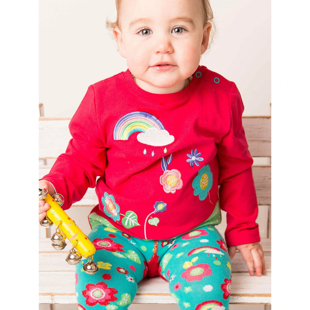 Blade & Rose Floral Garden Top - bold, bright and fun! This gorgeous magenta top has a lovely floral garden pattern with rainbow and cloud design.