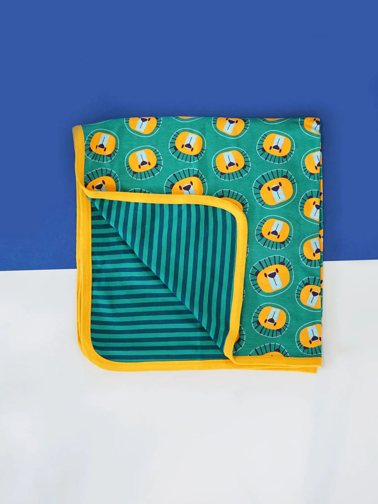 Blade & Rose Frankie The Lion Blanket - bold, bright and fun! This gorgeous blanket is made from soft cotton and features a yellow and green lion design on one side and contrasting stripes on the reverse. Sold by Say It Baby Gifts
