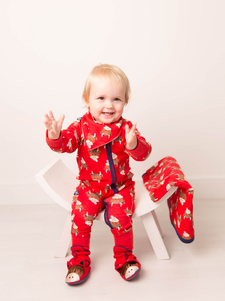 Blade & Rose Highland Cow Zip Up Romper - bold, bright and fun! This fab romper is bright red with contrasting navy zip and the cutest Highland Cow print design.