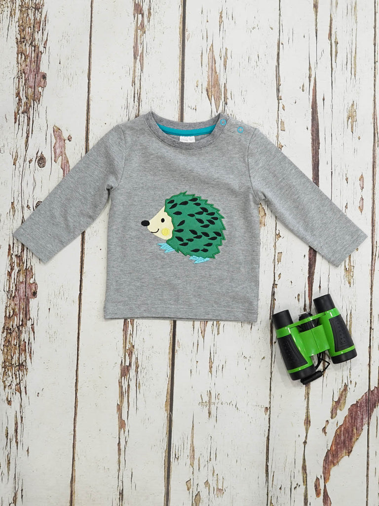 Blade & Rose Pip The Badger Top - bold, bright and fun! This gorgeous top features a sweet Hedgehog in green and charcoal with embroidery detail. Sold by Say It Baby Gifts