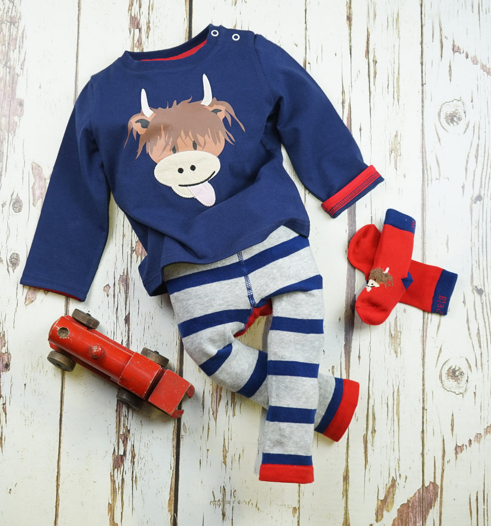 Blade & Rose Highland Cow Top - bold, bright and fun! This gorgeous navy top features a cute Highland Cow with a soft fleece nose.. Sold by Say It Baby Gifts