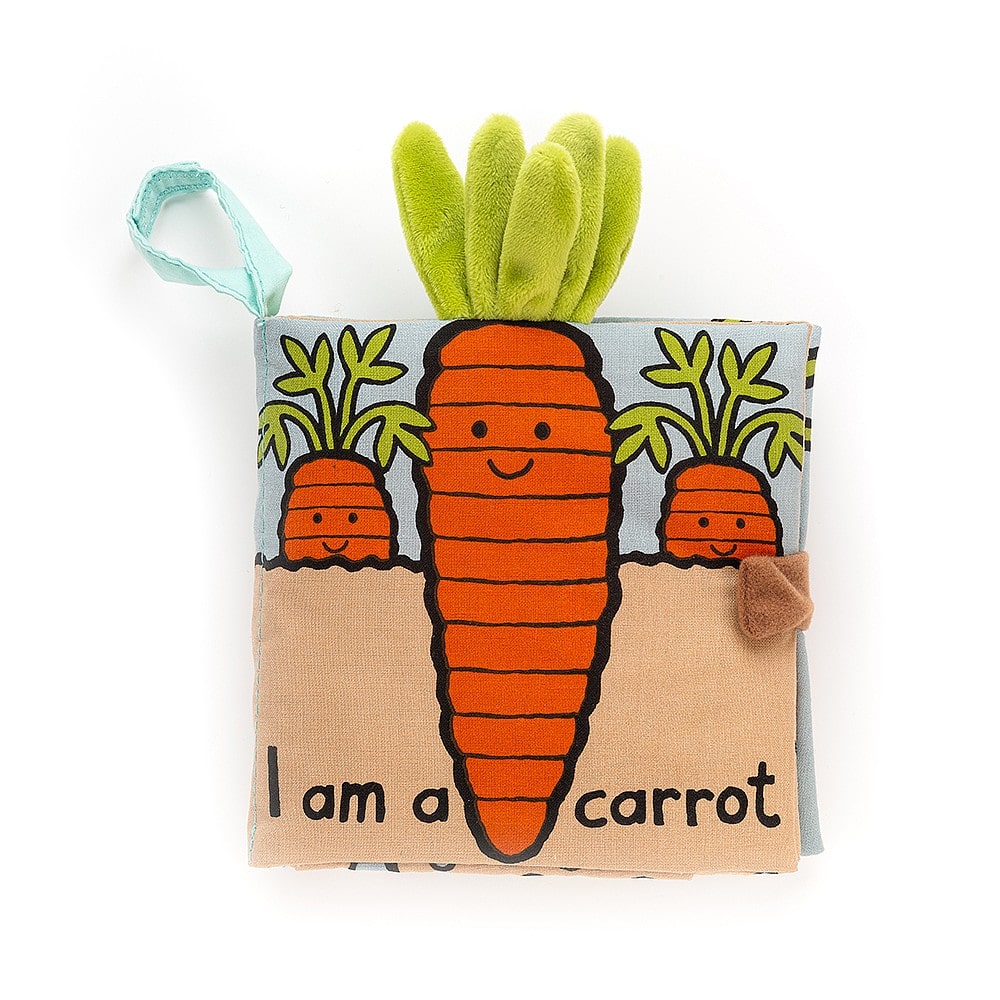 Jellycat Carrot Soft Fabric Book - This fantastic I Am A Carrot book by Jellycat is full of textures and lift up flaps, as well as green leafy top! Say It Baby Gifts