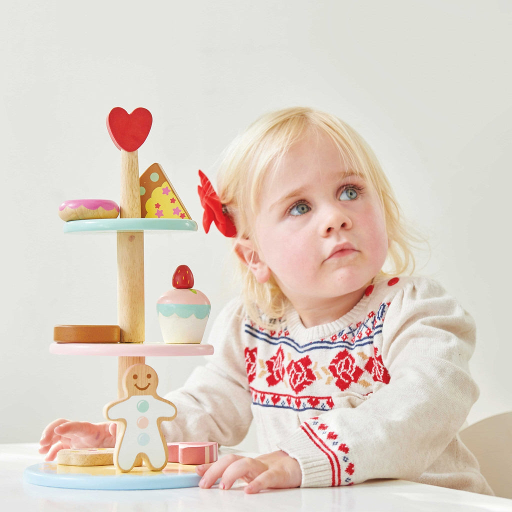 3 Tier Wooden Cake Stand by Le Toy Van. Pretend play promotes imaginative, social play