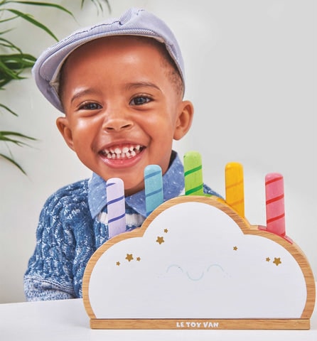Little ones will love to push down the rainbow sticks and wait for them to pop up! Can they catch them before they drop?! This sweet cloud is decorated in sweet pastel shades and adorned with lovely hand finished details.