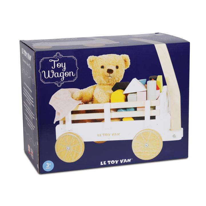 Le Toy Van Pull Along Wagon Cart. This timeless wagon is ideal for kids to collect, load and transport toys their around the house. This robust wagon is made from sustainable rubberwood and solid strong plywood and can be pulled along floors and carpets seamlessly.