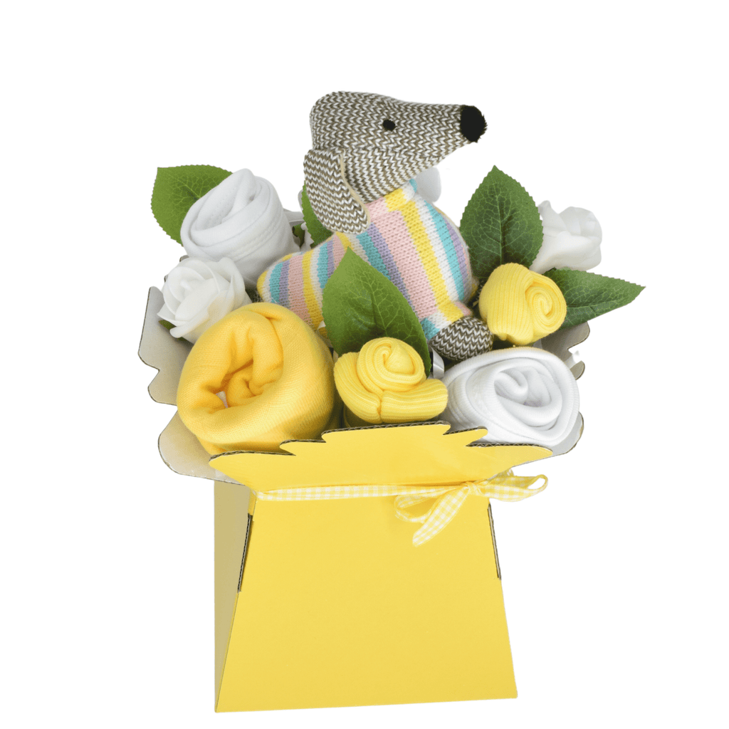Say It Baby - Hello Little One Bouquet. Welcome a little one into the world with this fab unisex baby bouquet featuring a sweet sausage dog wearing the cutest knitted pastel jumper!